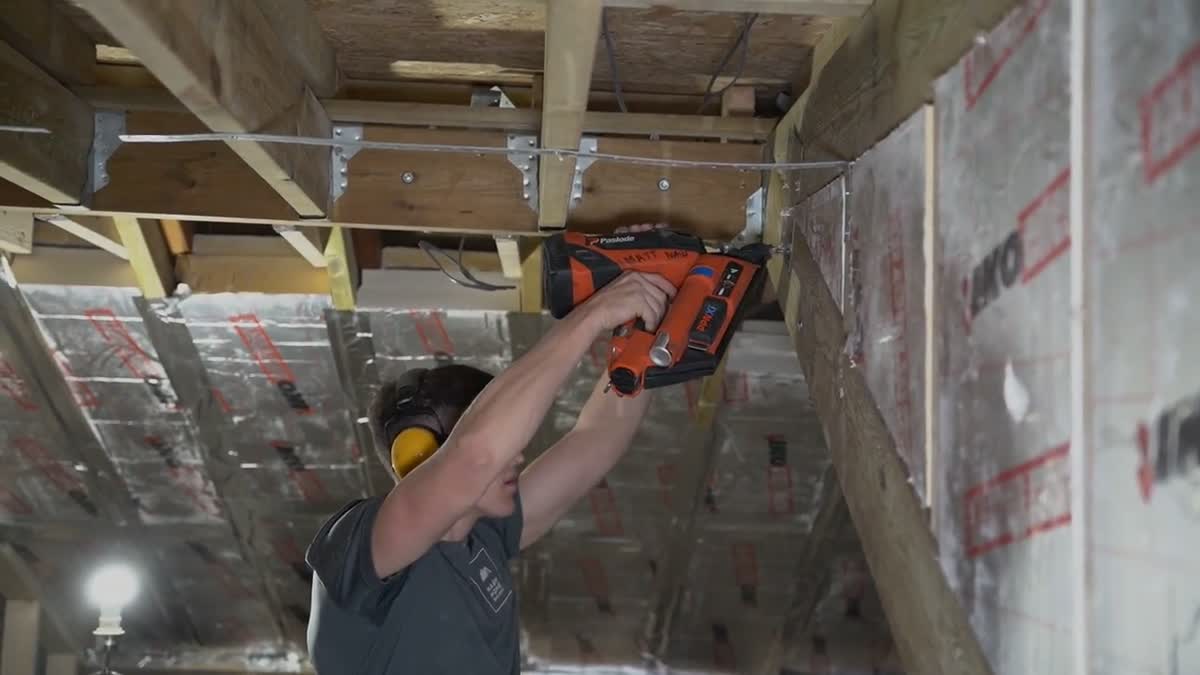 Crew installing attic insulation on an Ottawa home