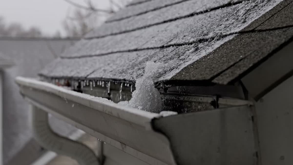 Ice dam forming at a roof eave during an Ottawa winter